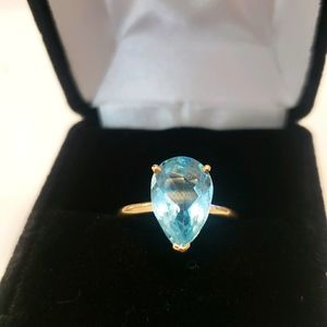 Blue topaz pear shaped gold ring